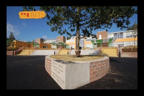 Red brick and ochre laminate panels give a warm feel to the school’s exterior